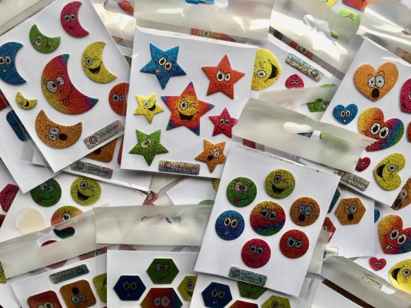 Klaparmband glitter traktatie smiley